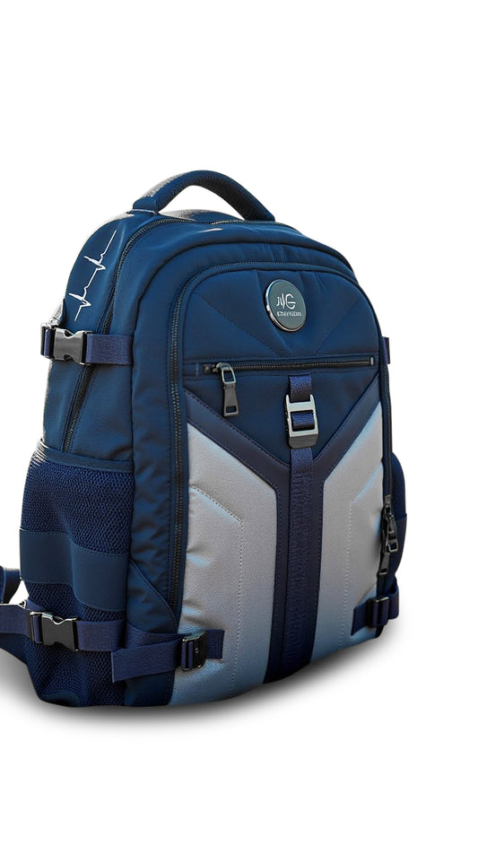 Navy blue and gray MG Aviator IJ backpack by MoxieGalia with USB port, tech compartments, laptop sleeve and utility ideal for work, travel, or daily use”
