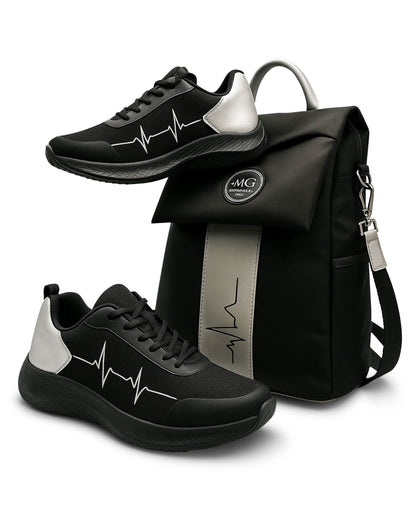 MoxieGalia StandFX 12 sneakers in black and white with signature ECG design displayed next to the Gidi-Up Lite backpack in black with contrast stripe — styled together for a sleek, everyday professional look